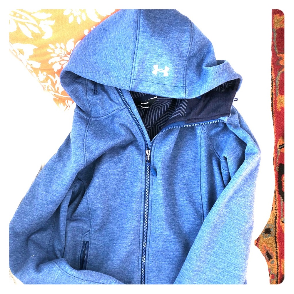 Size Medium woman’s UNDER ARMOR jacket.